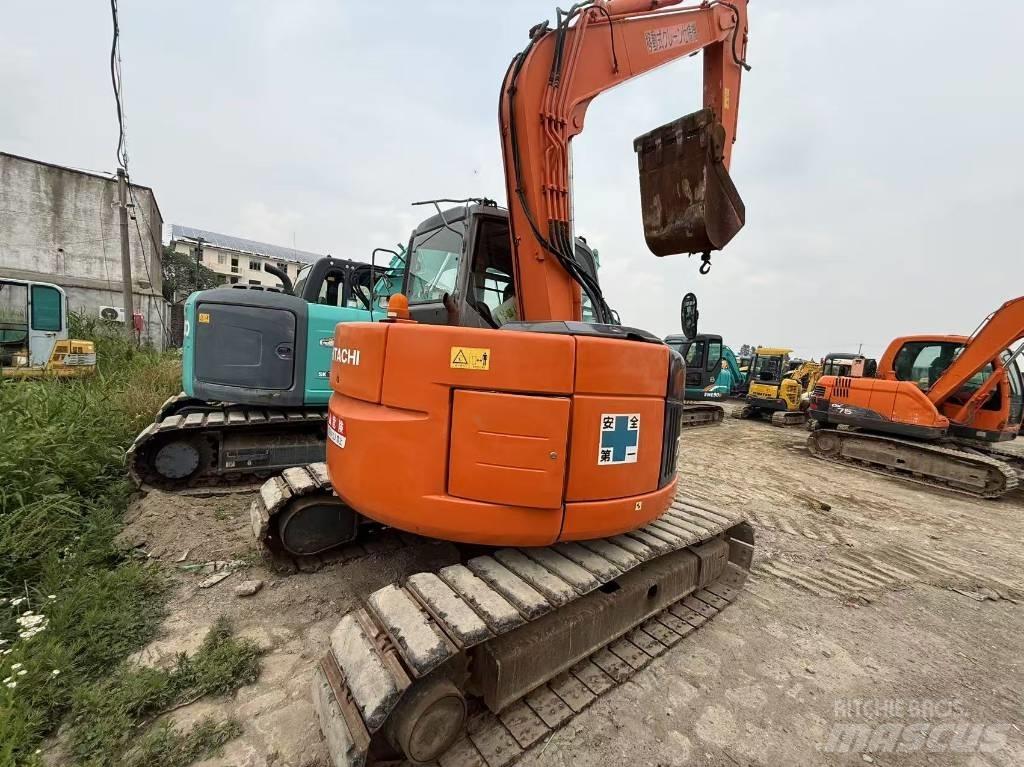 Hitachi ZX 75 US حفارات وسط 7 طن - 12 طن