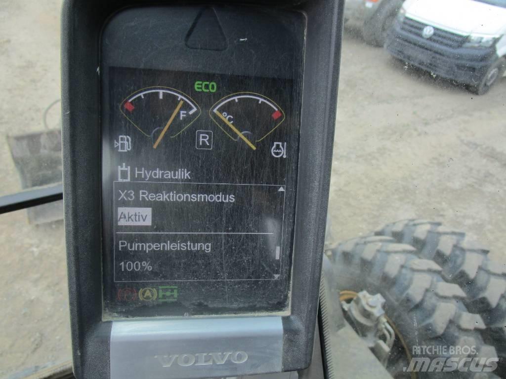 Volvo EW 140 D حفارات بعجل