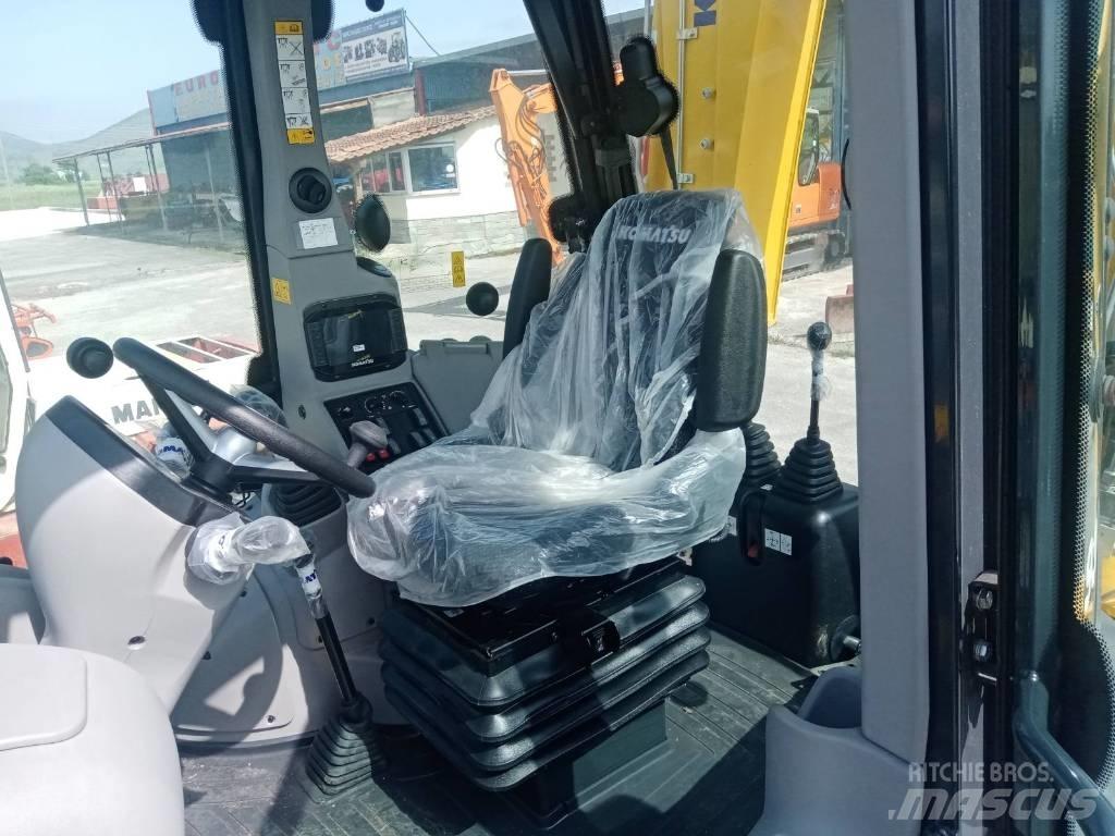 Komatsu WB 93 S لوادر ذات جرافات عكسية
