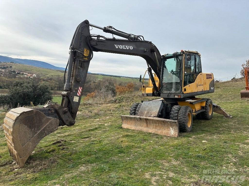 Volvo EW 140 C حفارات بعجل