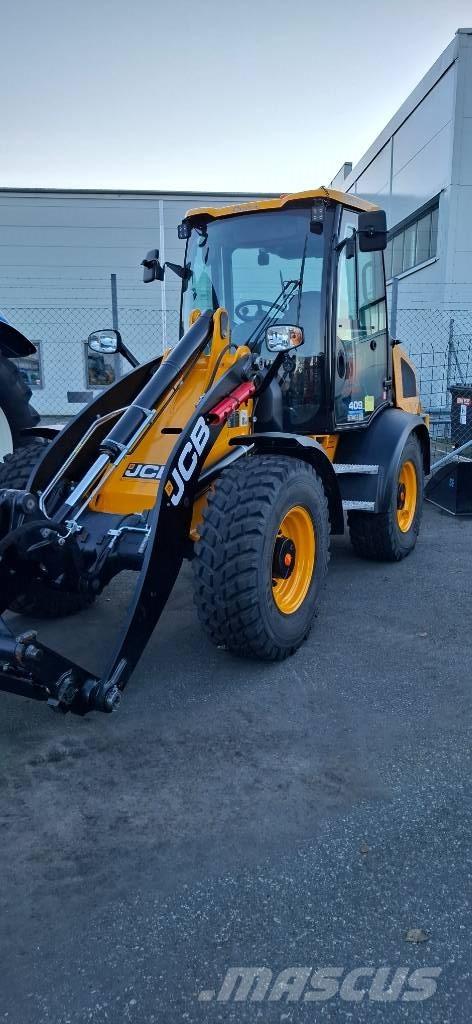 JCB 409 لوادر بعجل