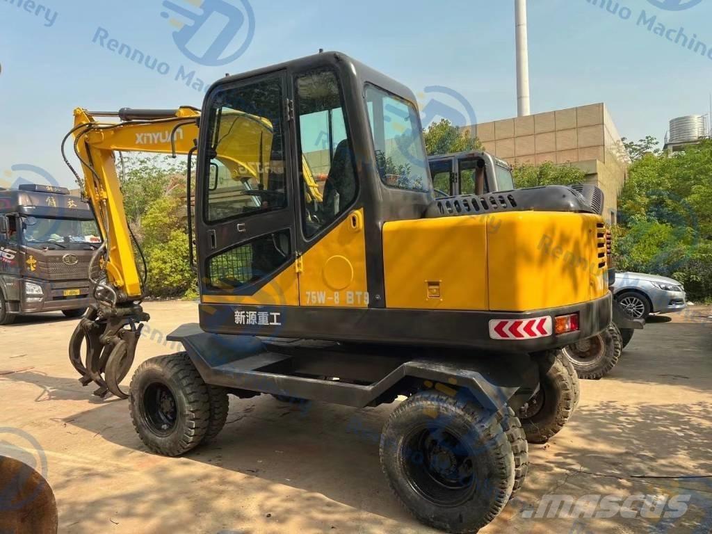 Xinyuan XYB75 حفارات بعجل