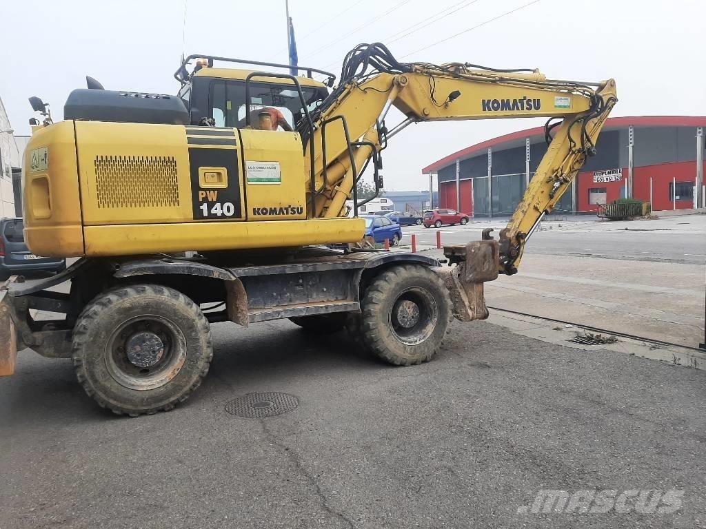 Komatsu PW 140-7 حفارات بعجل