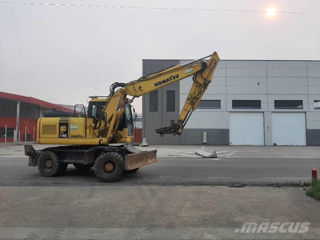 Komatsu PW 140-7 حفارات بعجل