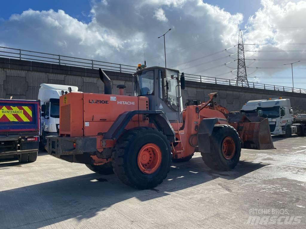 Hitachi LX 210 E لوادر بعجل