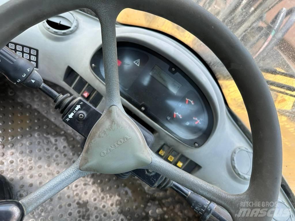 Volvo L180E لوادر بعجل