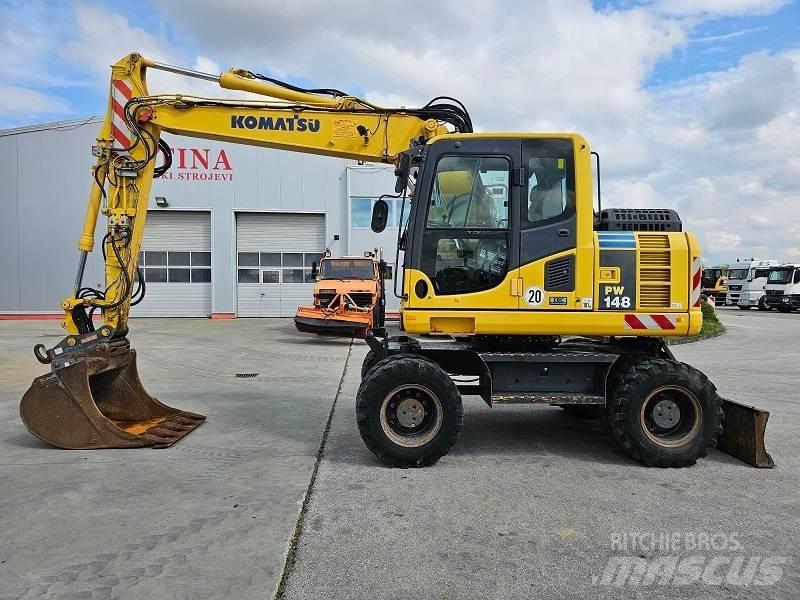 Komatsu PW 148-8 حفارات بعجل