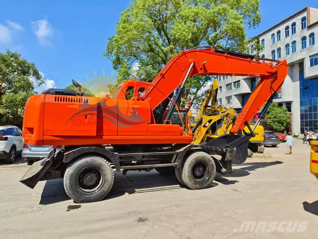 Doosan DH 210 W-7 حفارات بعجل