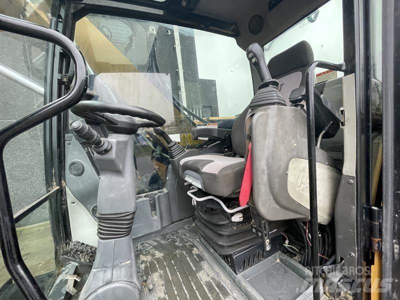 CAT M 314 F حفارات بعجل