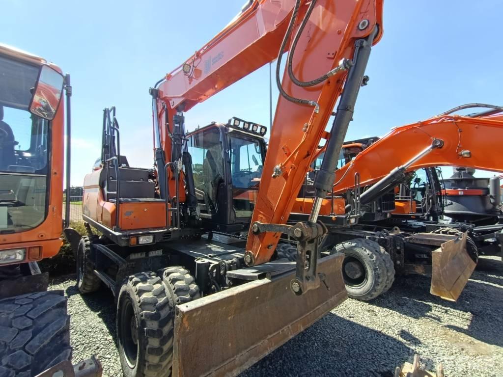 Doosan DX140W-5 حفارات بعجل