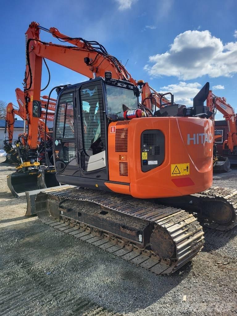 Hitachi ZX 135 US-6 حفارات زحافة