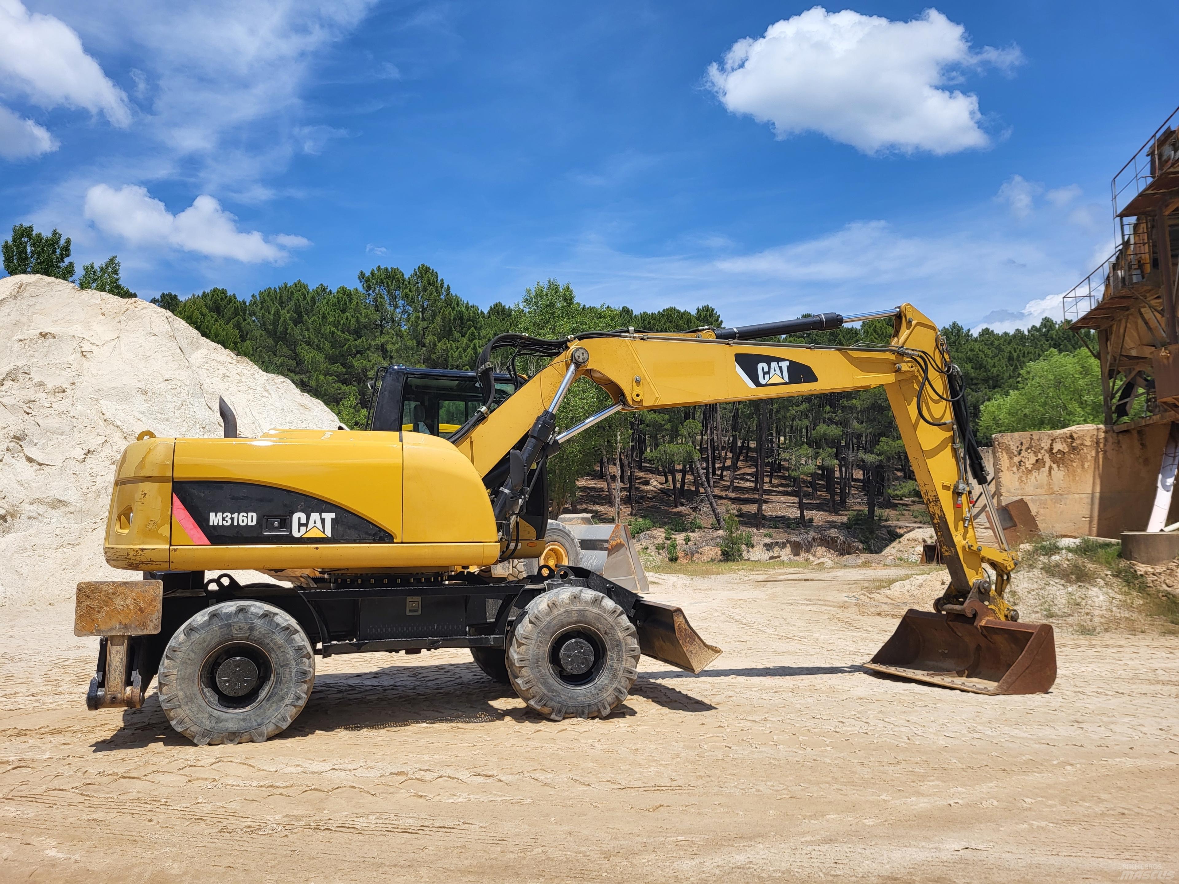 CAT 316d حفارات بعجل