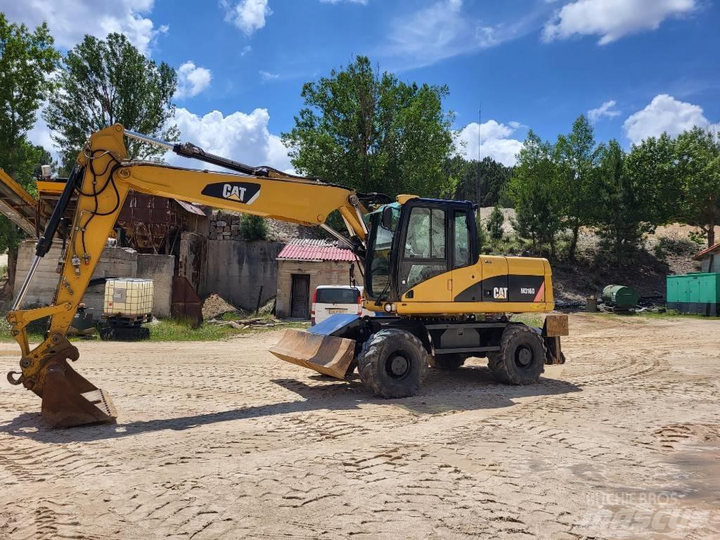 CAT 316d حفارات بعجل