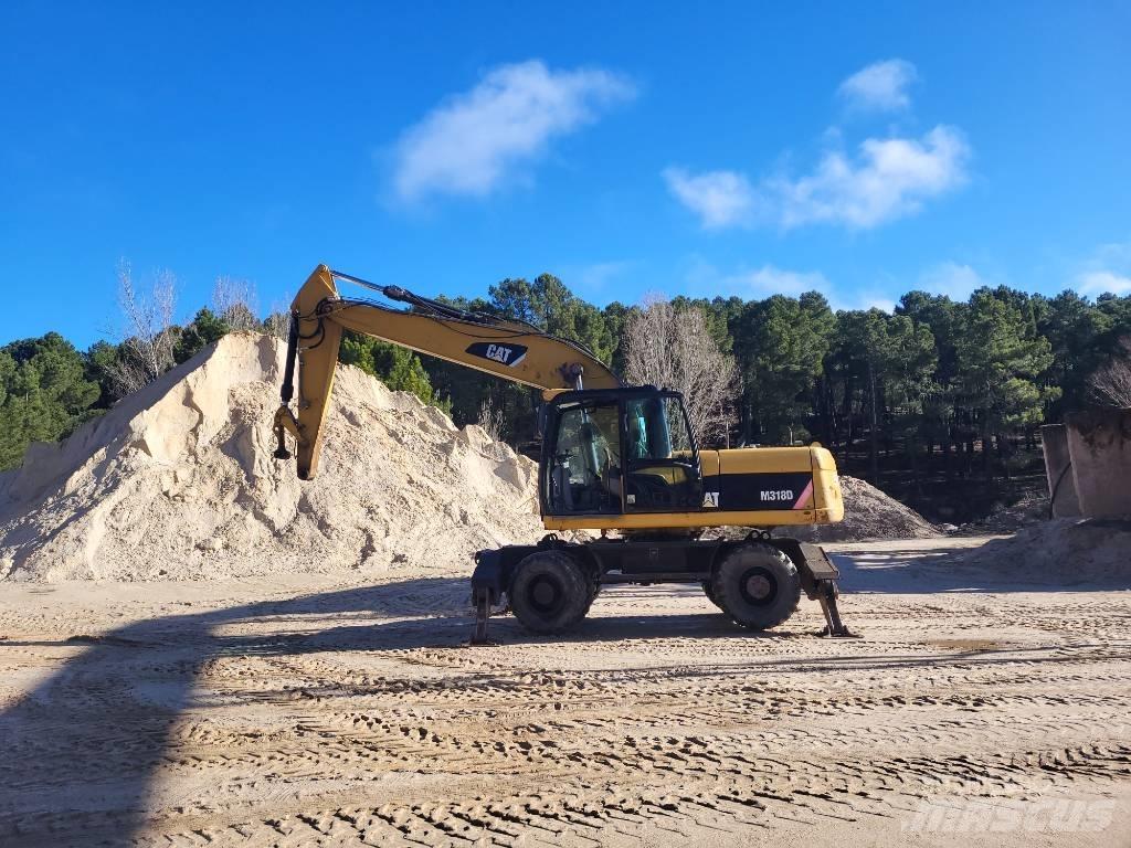 CAT 316d حفارات بعجل