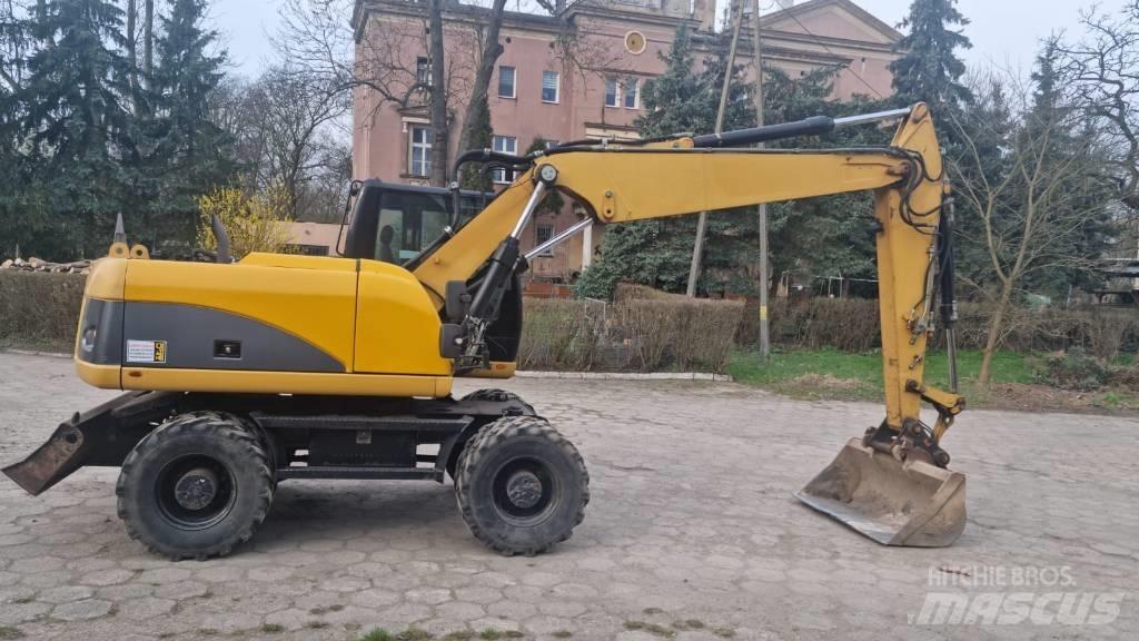 CAT M 315 D حفارات بعجل