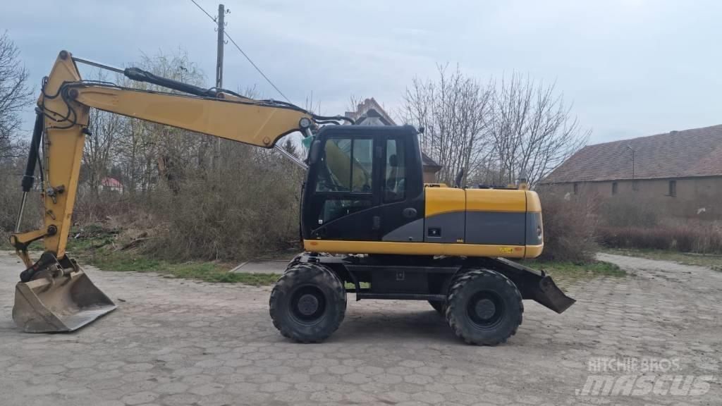 CAT M 315 D حفارات بعجل