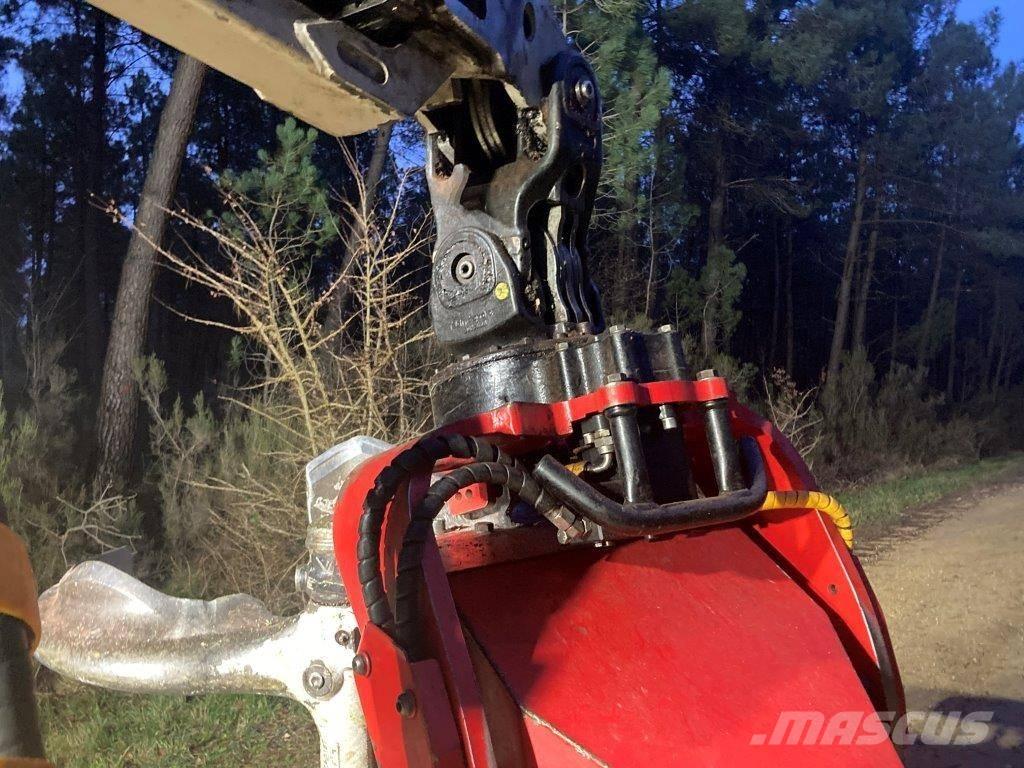 Komatsu C 144 حصادات