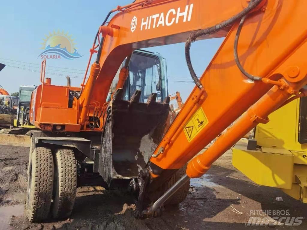 Hitachi EX 100 W D-2 حفارات بعجل
