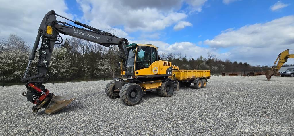 Volvo EW 140 C حفارات بعجل