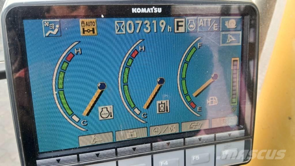Komatsu PW 148-8 حفارات بعجل