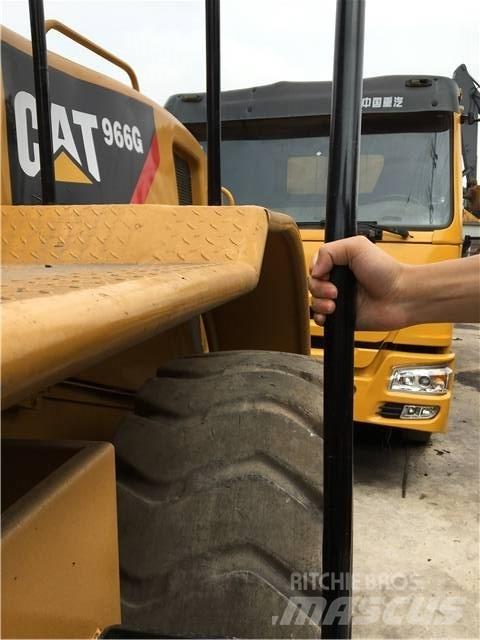CAT 966G لوادر بعجل