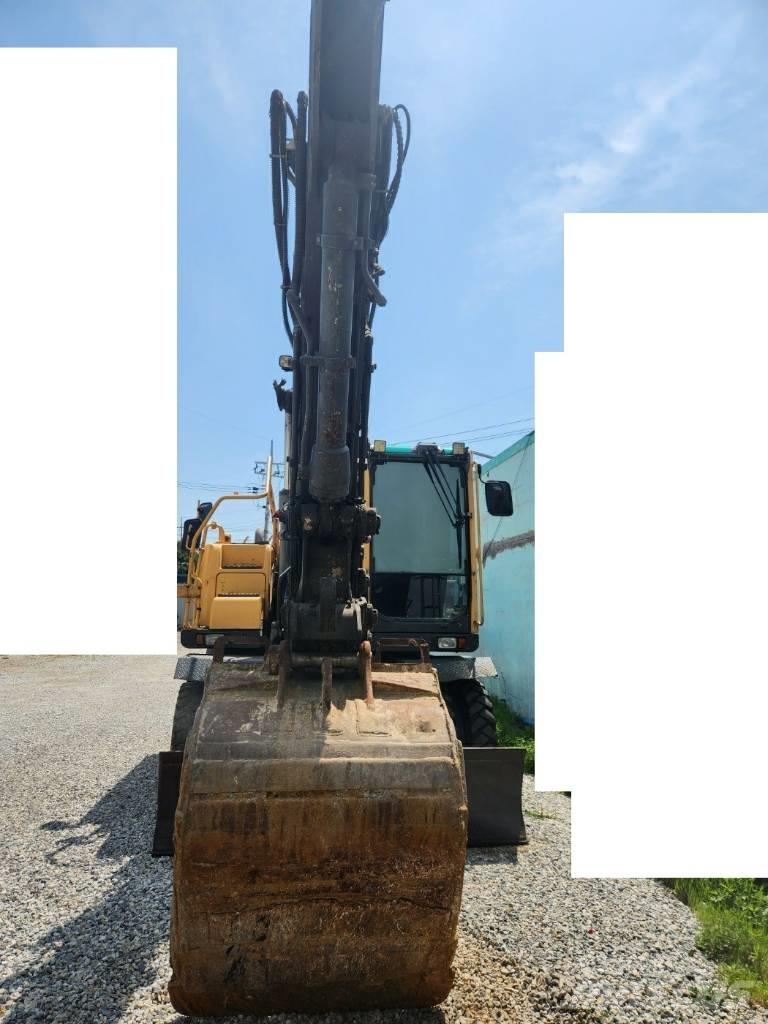 Volvo EW145BP حفارات بعجل