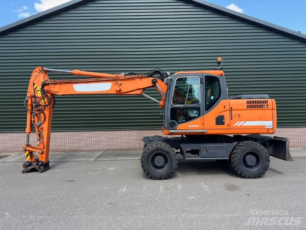 Doosan DX 170 W حفارات بعجل