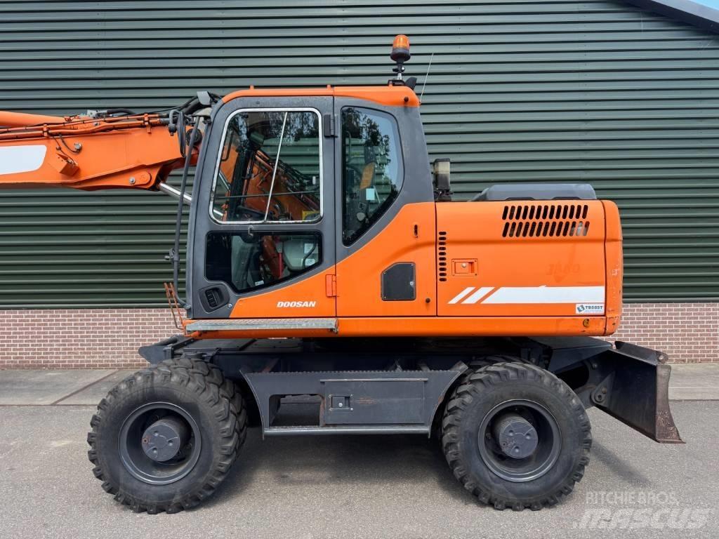 Doosan DX 170 W حفارات بعجل