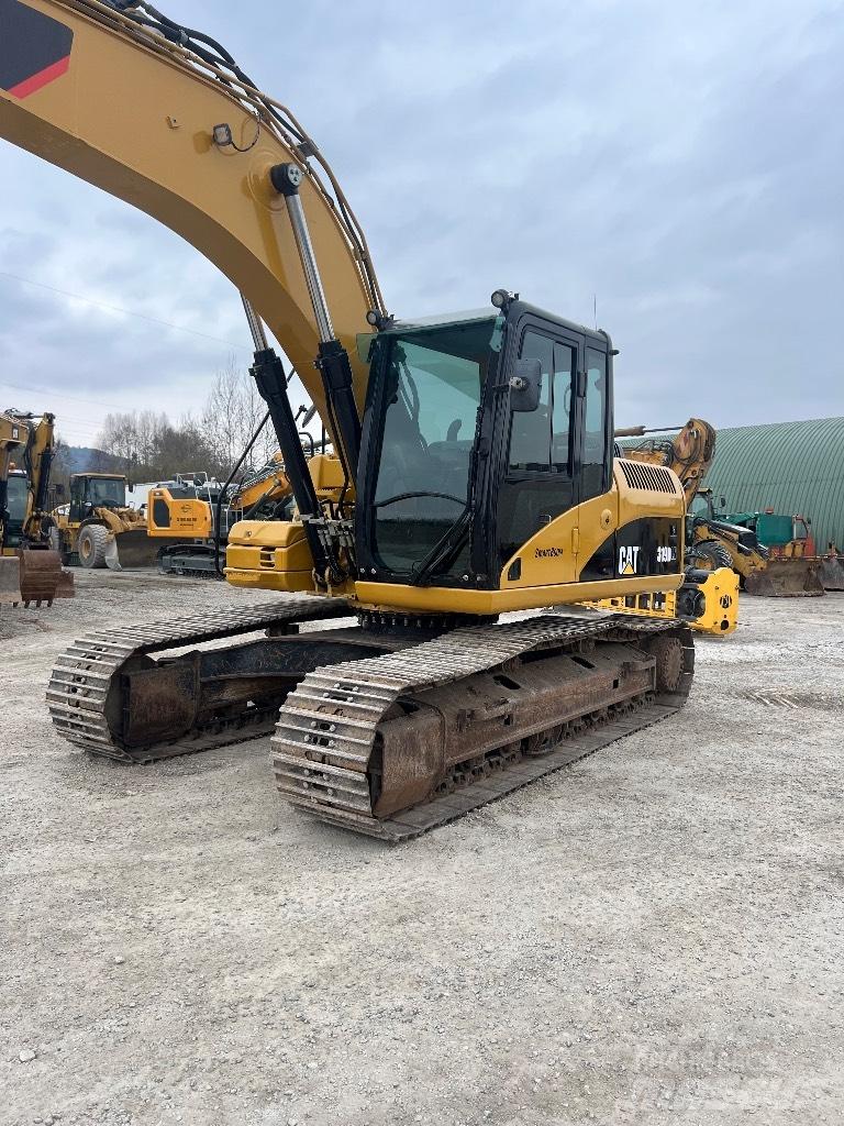 CAT 319 D LN حفارات زحافة