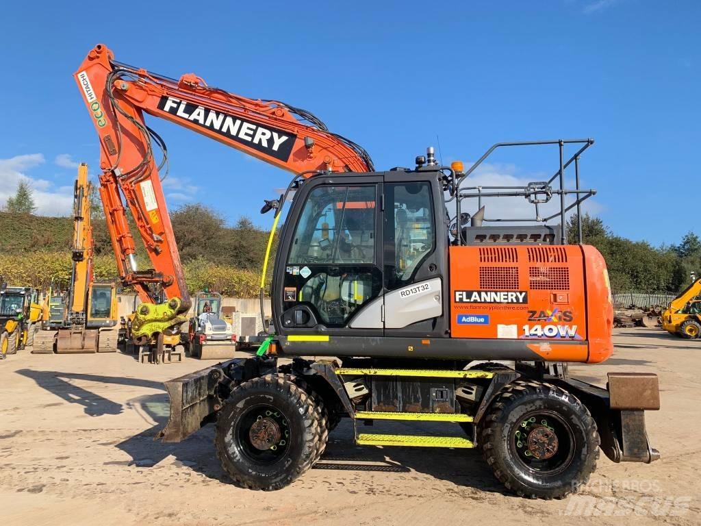 Hitachi ZX 140 W حفارات بعجل