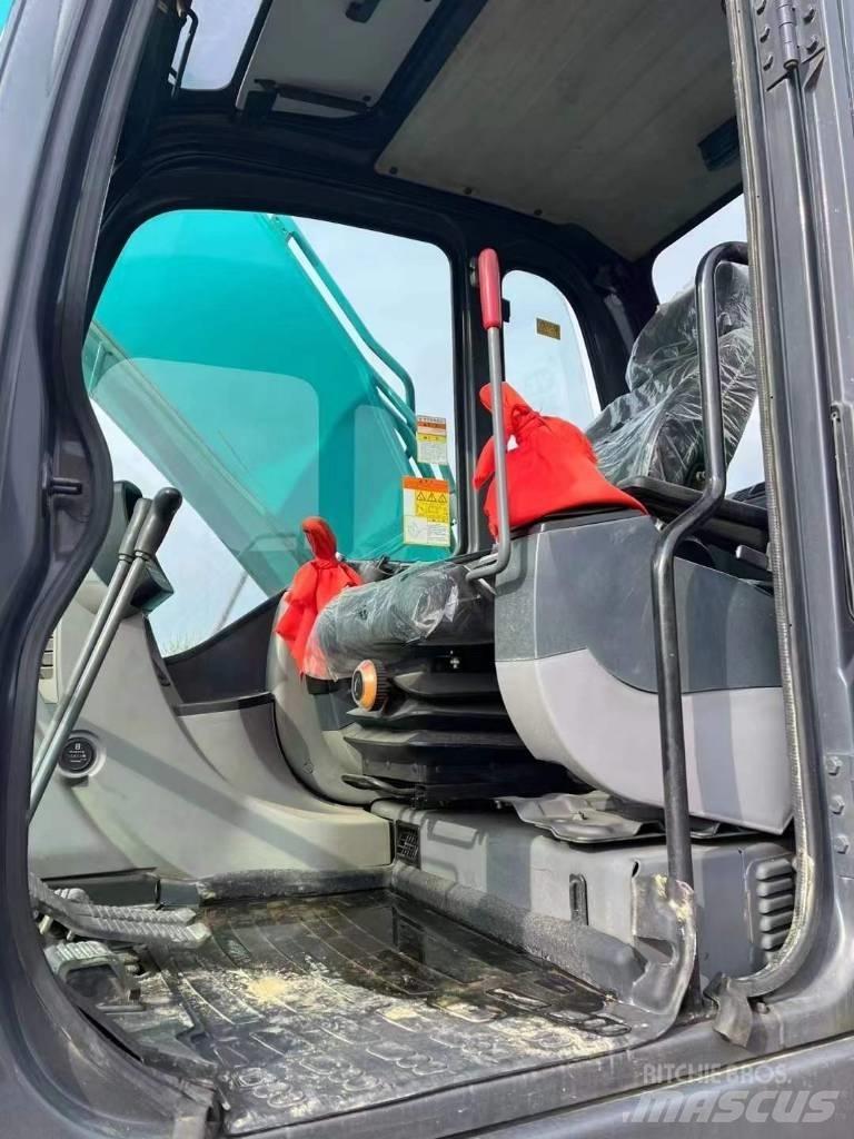 Kobelco SK210 حفارات زحافة
