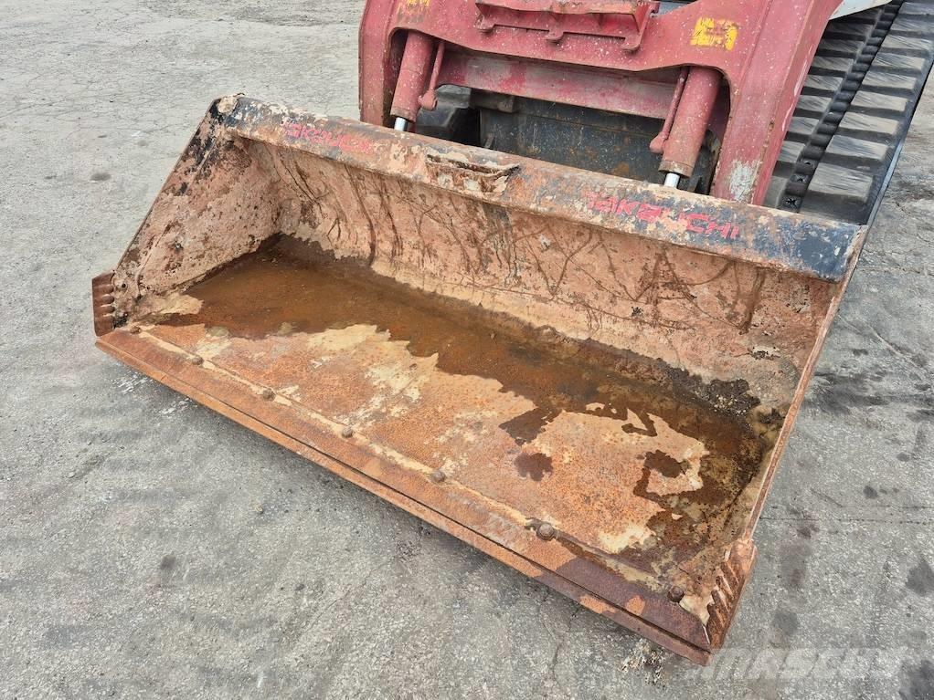 Takeuchi TL12 لوادر انزلاقية التوجيه