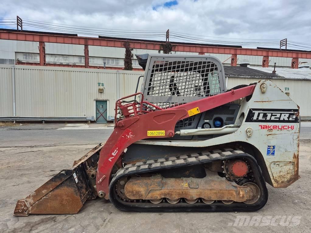 Takeuchi TL12 لوادر انزلاقية التوجيه