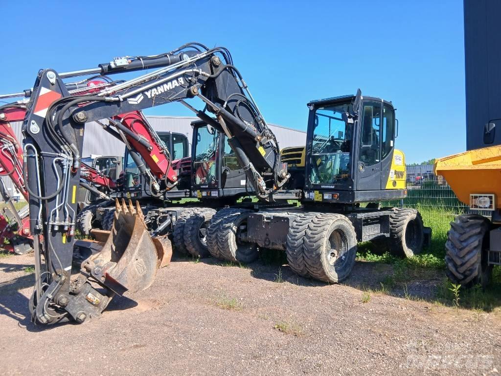 Yanmar B 110 W حفارات بعجل