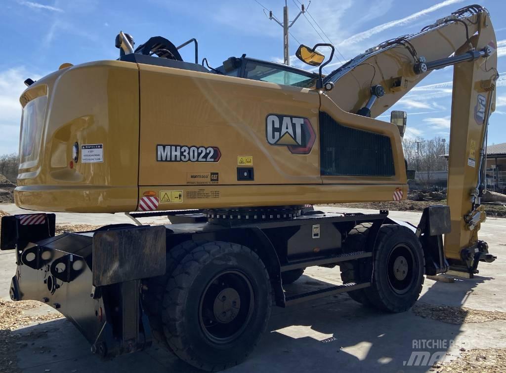 CAT MH 3022 حفارات بعجل
