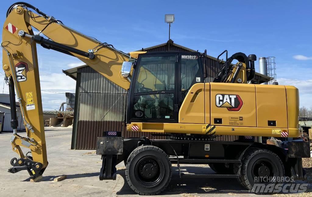 CAT MH 3022 حفارات بعجل