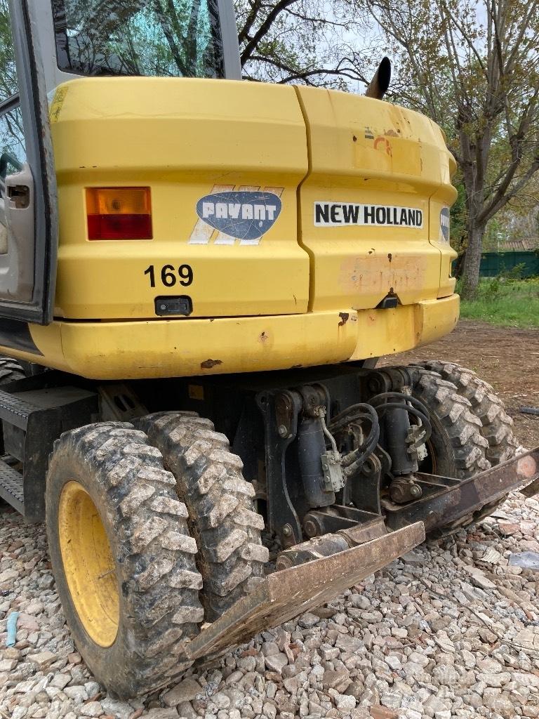 New Holland MH 2.6 حفارات بعجل