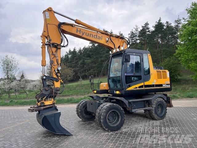 Hyundai Robex 140 W حفارات بعجل