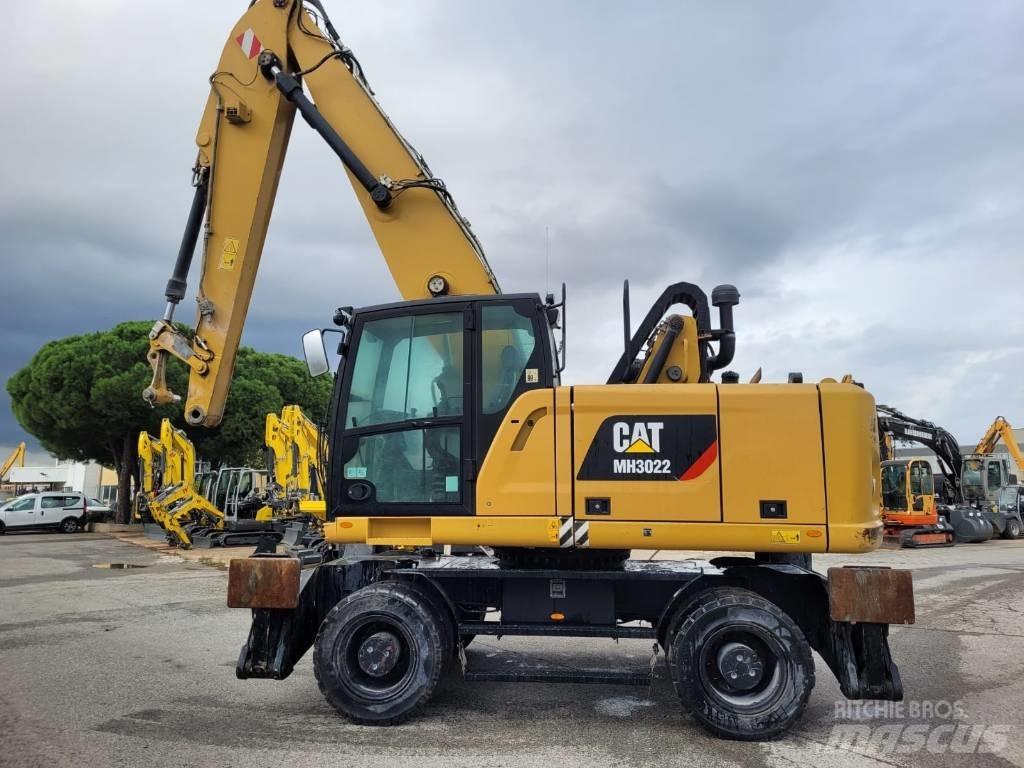 CAT mh3022 حفارات بعجل