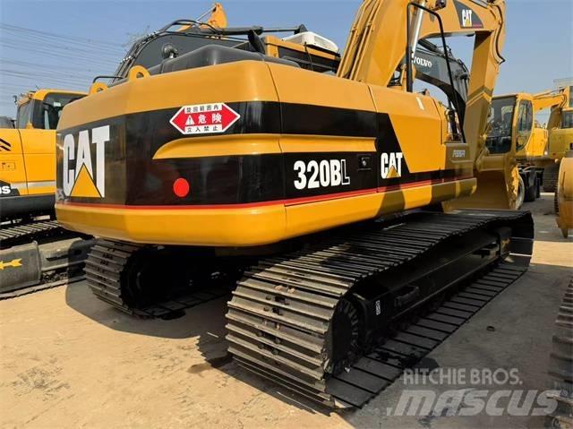 CAT 320 B L حفارات زحافة