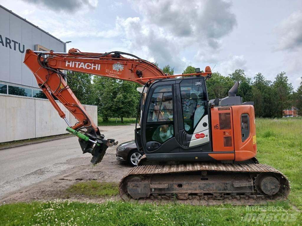 Hitachi ZX 135 US-6 حفارات زحافة