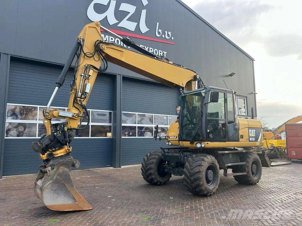 CAT M315D حفارات بعجل