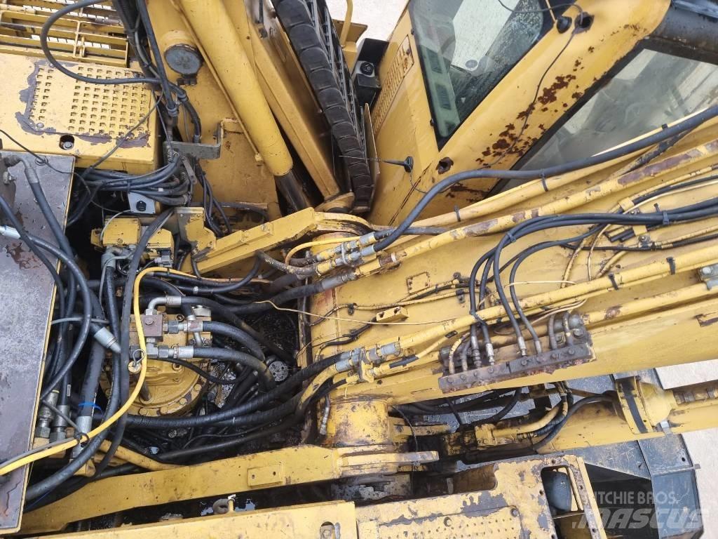 CAT M 325 C L MH مناولات المخلفات / مناولات صناعية