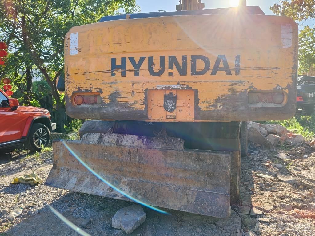 Hyundai Robex 210w-7 حفارات بعجل