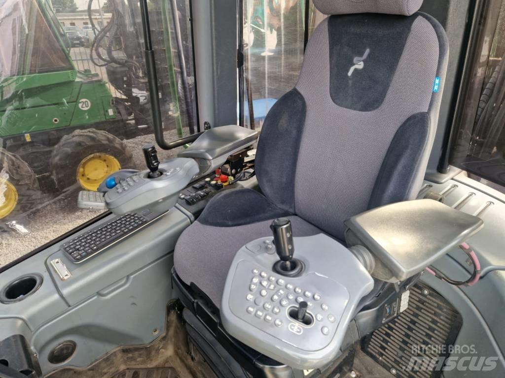John Deere 1210 E شاحنات