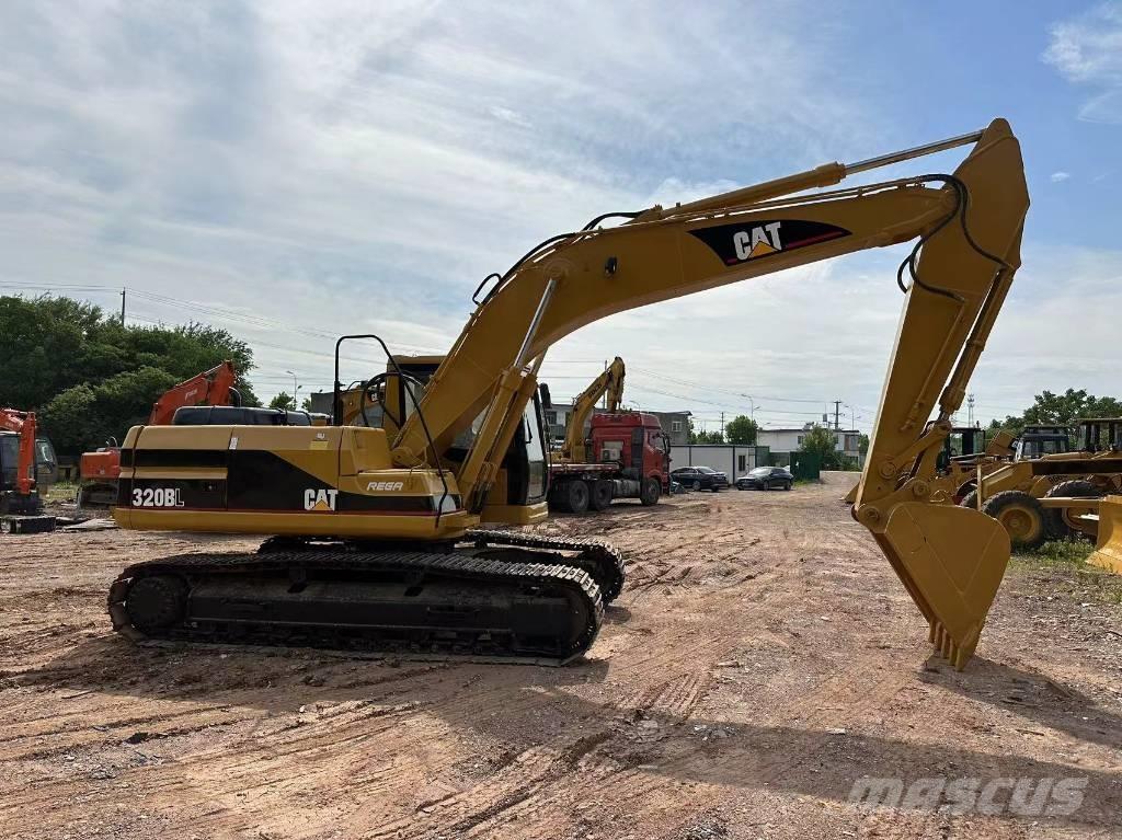 CAT 320 B L حفارات زحافة