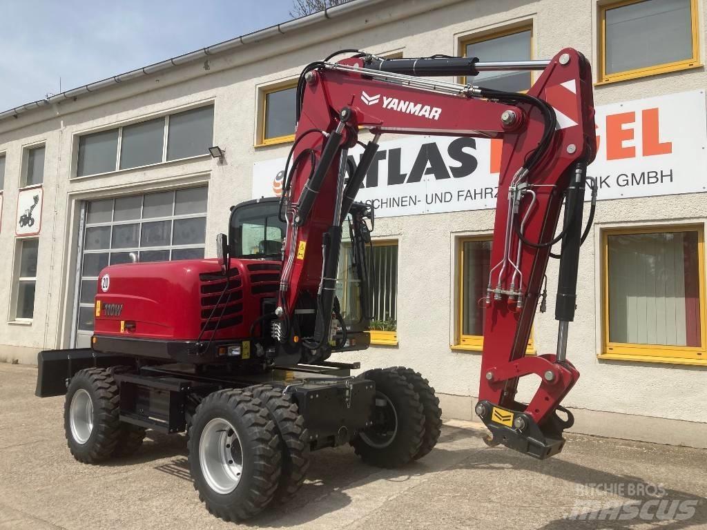 Yanmar B 110 W حفارات بعجل