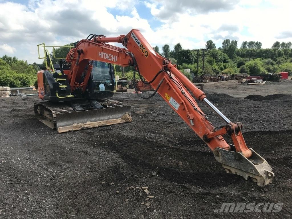 Hitachi ZX 135 US-6 حفارات زحافة