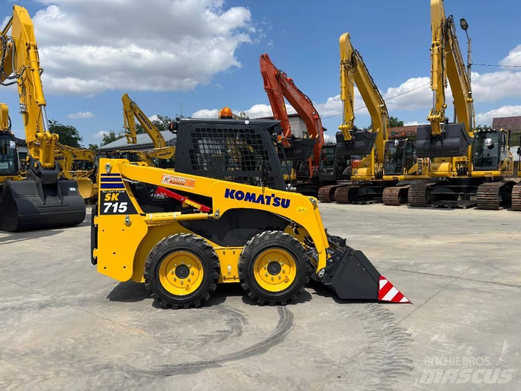 Komatsu SK 715-8 لوادر انزلاقية التوجيه