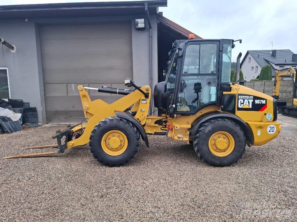 CAT 907 M لوادر بعجل